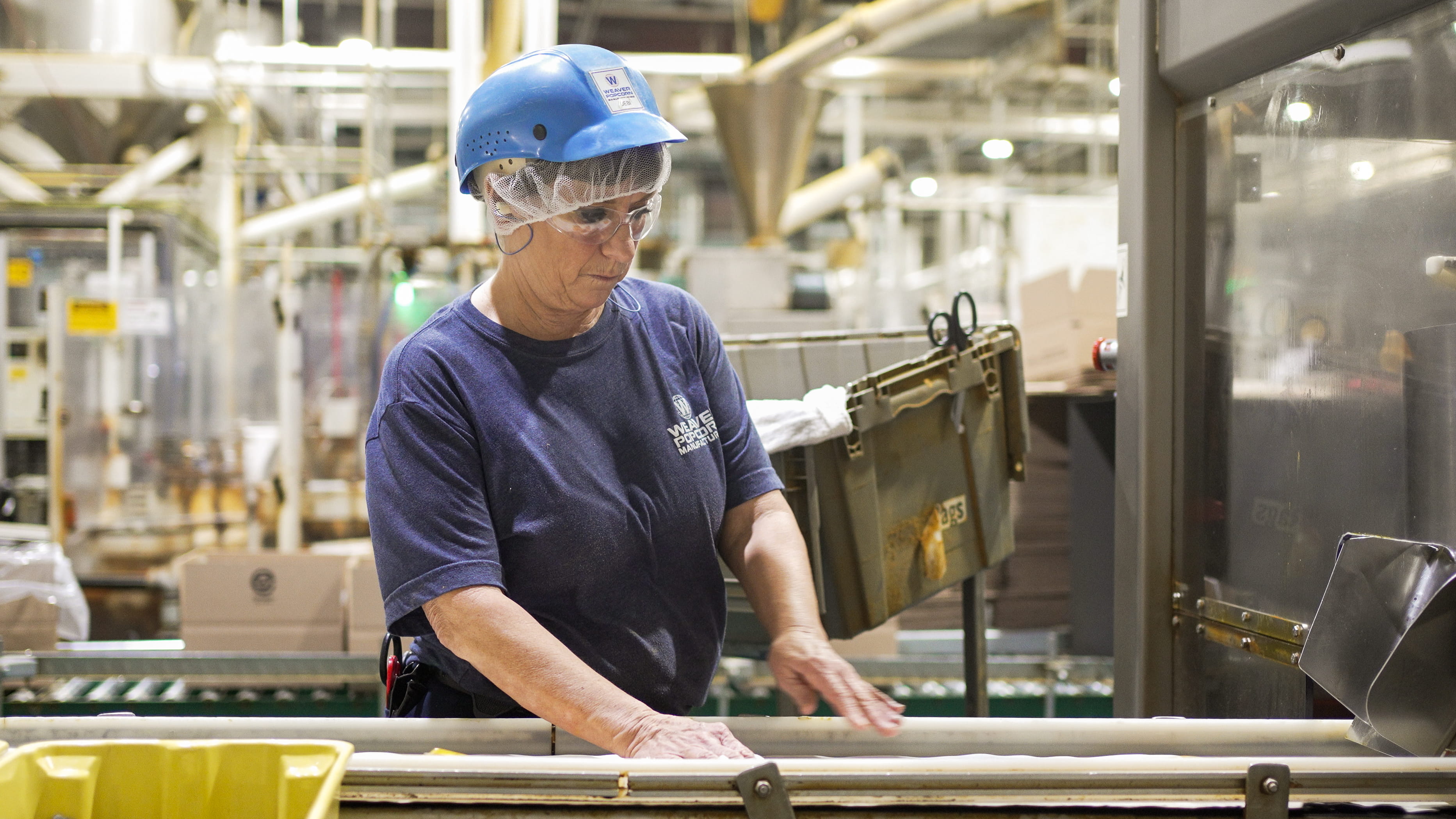 Female Employee Working on Line